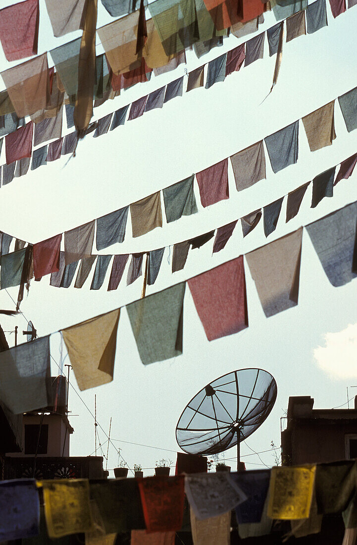 Prayer Flags And Satellite Dish.