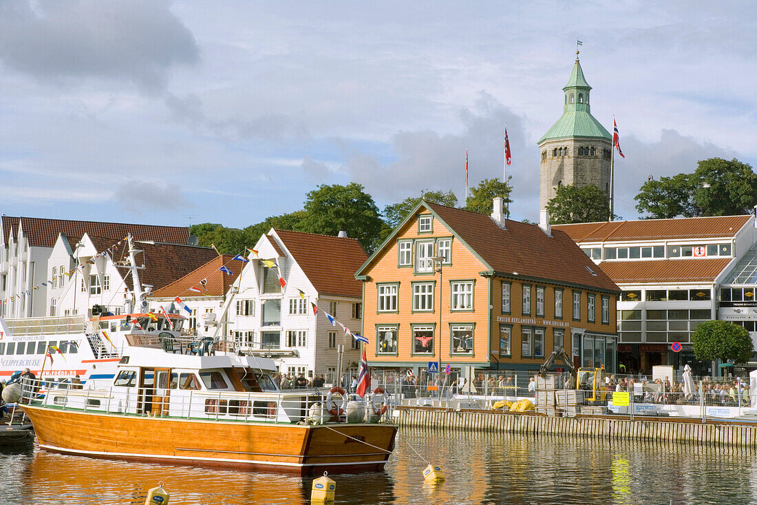 Wooden Warehouses On The Waterside And The Valberg Tower On The Hilltop