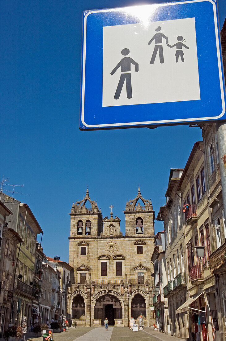 Braga Cathedral And Pedestrian Road Sign