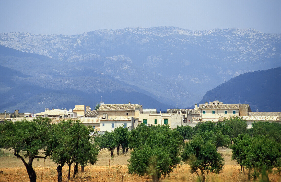 Rural Village At The Base Of Mountains