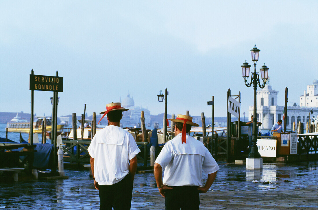 Gondoliers Viewing The Flooding Of The Lagoon