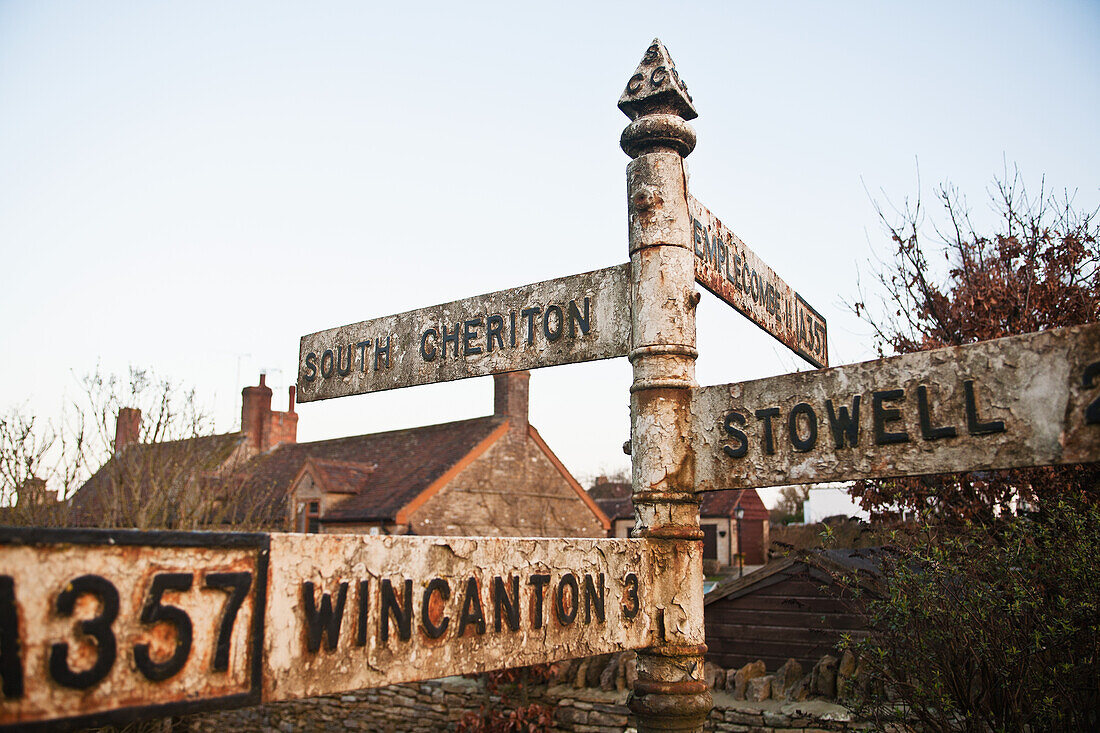 Old style road sign on A357 on the edge of South Cheriton village; Somerset England