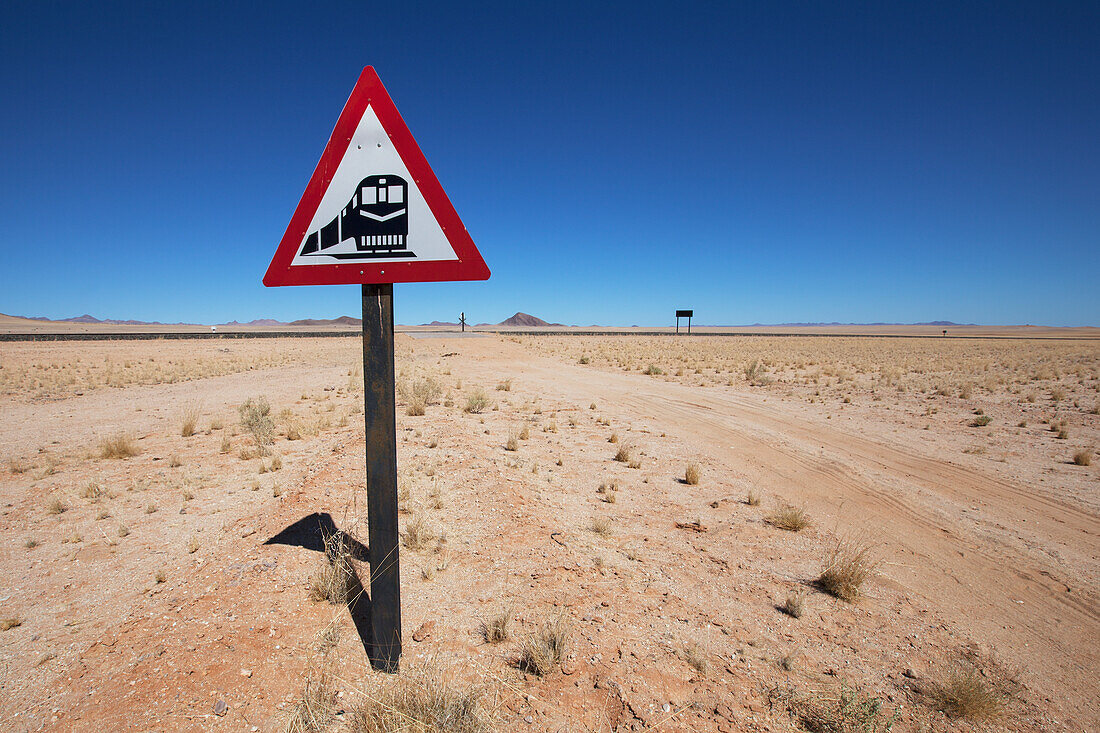 Railway traffic sign beside a desert road; Garub namibia