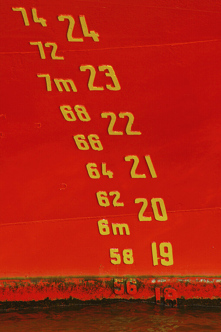 Numbers In Ascending Sequence On A Red Wall Above The Water; Hamburg, Germany