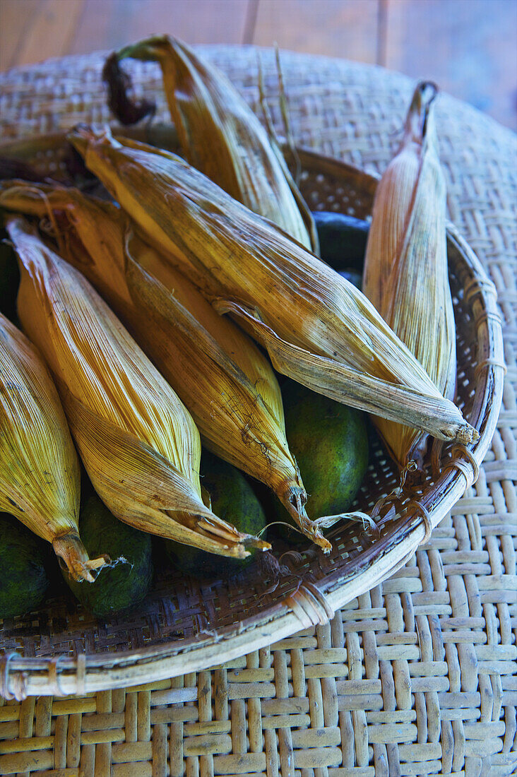 Cobs Of Corn In Their Husks In A Bowl; Ulpotha, Embogama, Sri Lanka