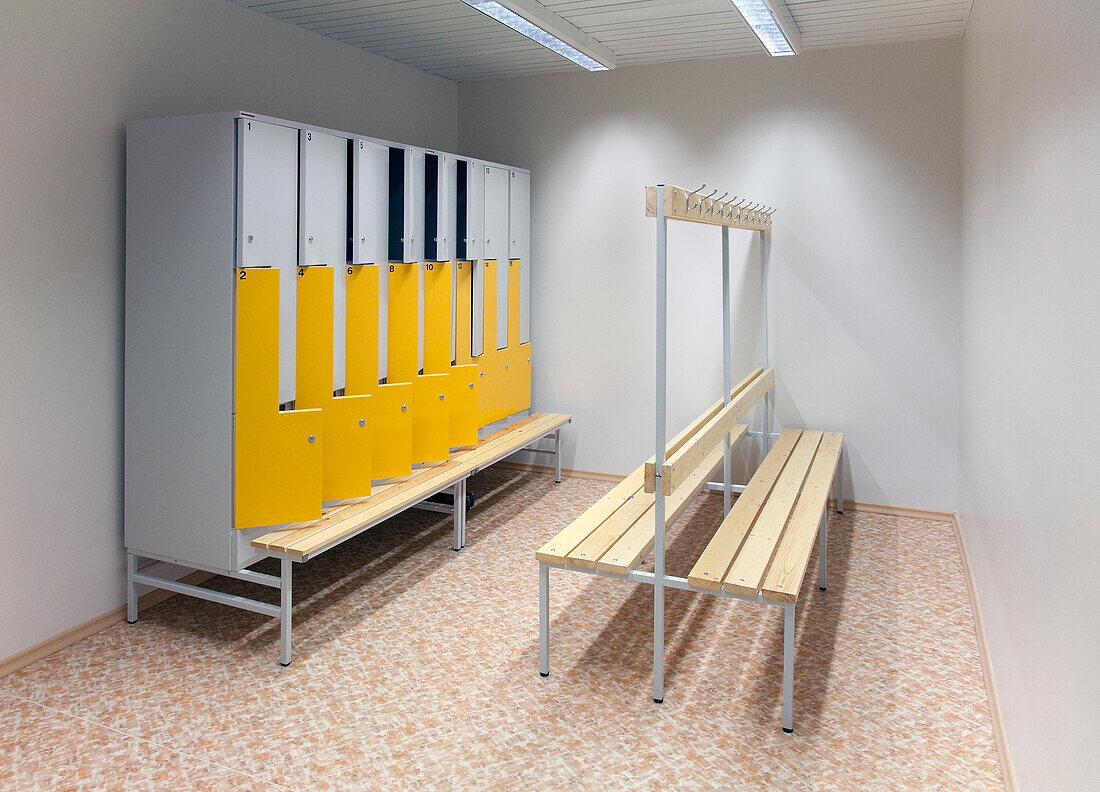 A changing room or locker room in a school or technical college. Interior.