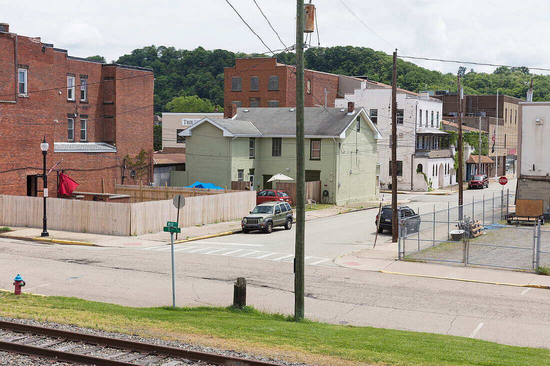 Street corner and buildings along an empty road.