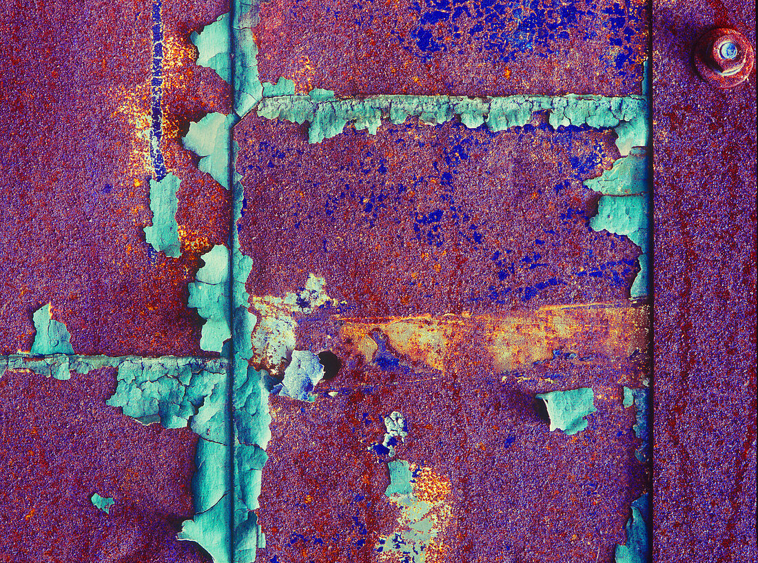 Detail of a metal door in an abandoned sweater mill. (Large format sizes available)