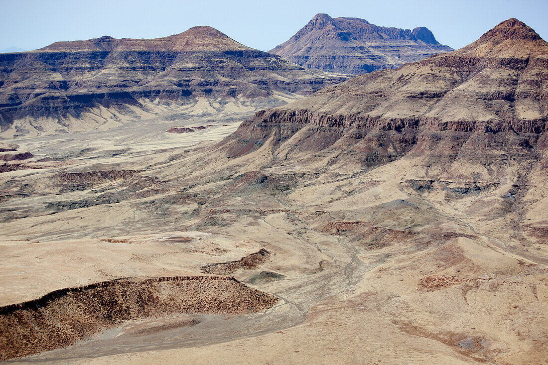 Africa, Namibia, Damaraland. Aerial view of the mountains and red rocks of Damaraland.