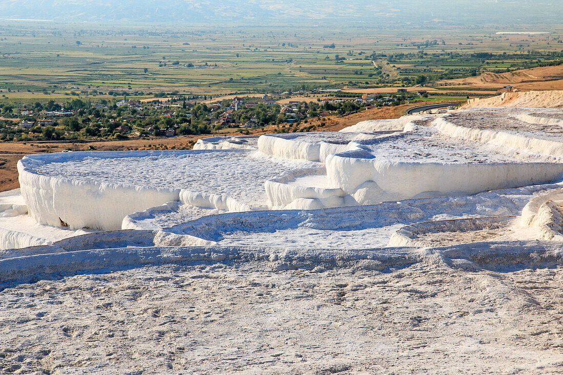 Turkey, Denizli Province, River Menderes valley, Pamukkale. Cotton castle, a natural site of hot springs and travertines, terraces of carbonate mineral pools.