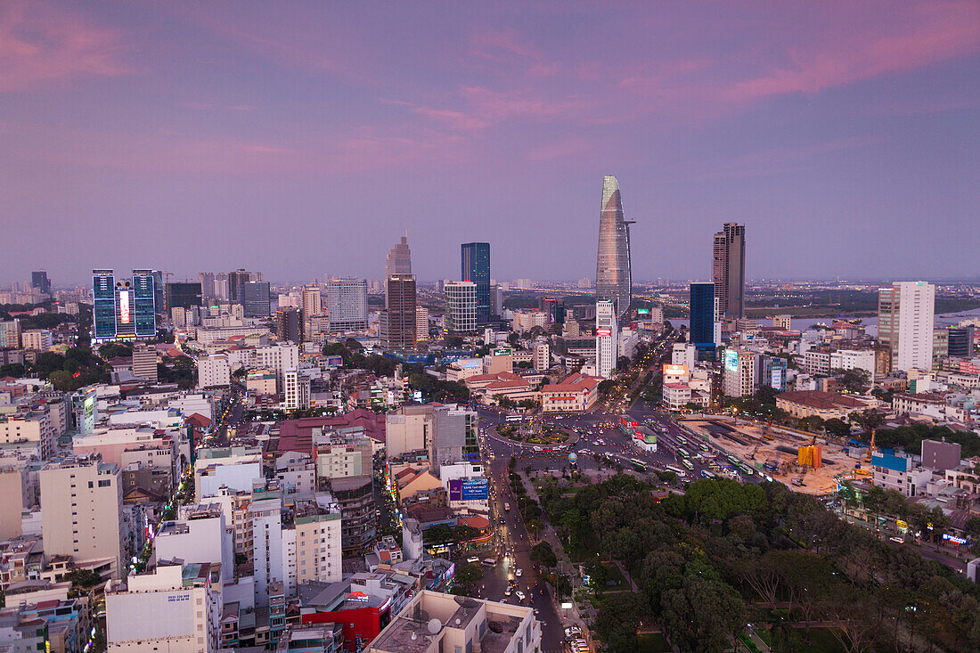 Vietnam, Ho Chi Minh City. Elevated city view above Quach Thi Trang Circle, dusk