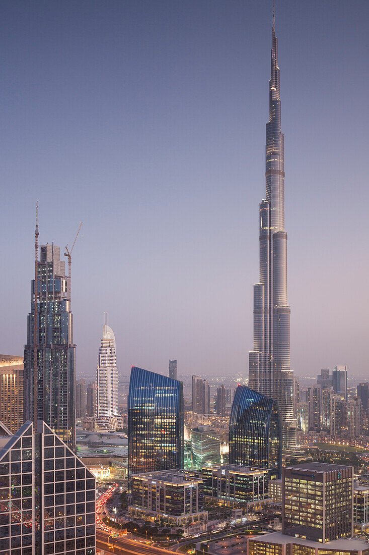 UAE, Downtown Dubai. Elevated view over Sheikh Zayed Road and Burj Khalifa Tower, world's tallest building, 2016