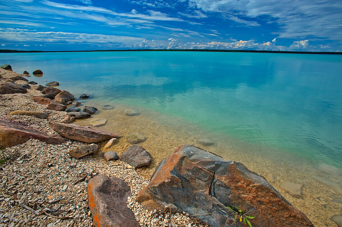 Canada, Manitoba, Little Limestone Lake. Lake and rocks on shore