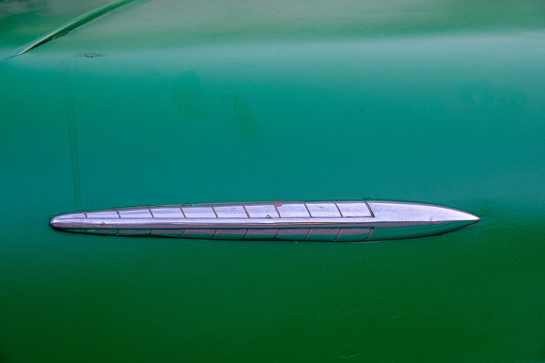 Detail of green classic American Pontiac car in Habana, Havana, Cuba.