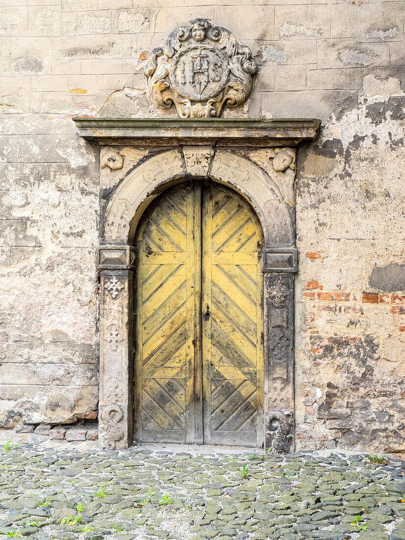 Czech Republic, Jicin. Doorway entrance to a church in the historic town of Jicin.