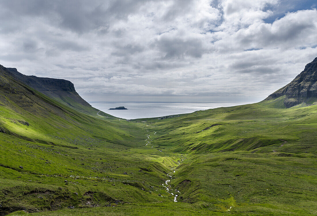 The Village Gasadalur. Island Vagar, Part Of The Faroe Islands In The North Atlantic. Denmark