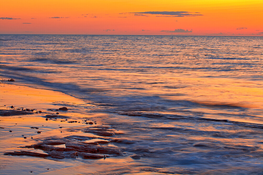 Canada, Prince Edward Island, Cable Head. Shoreline along Gulf of St. Lawrence at sunset