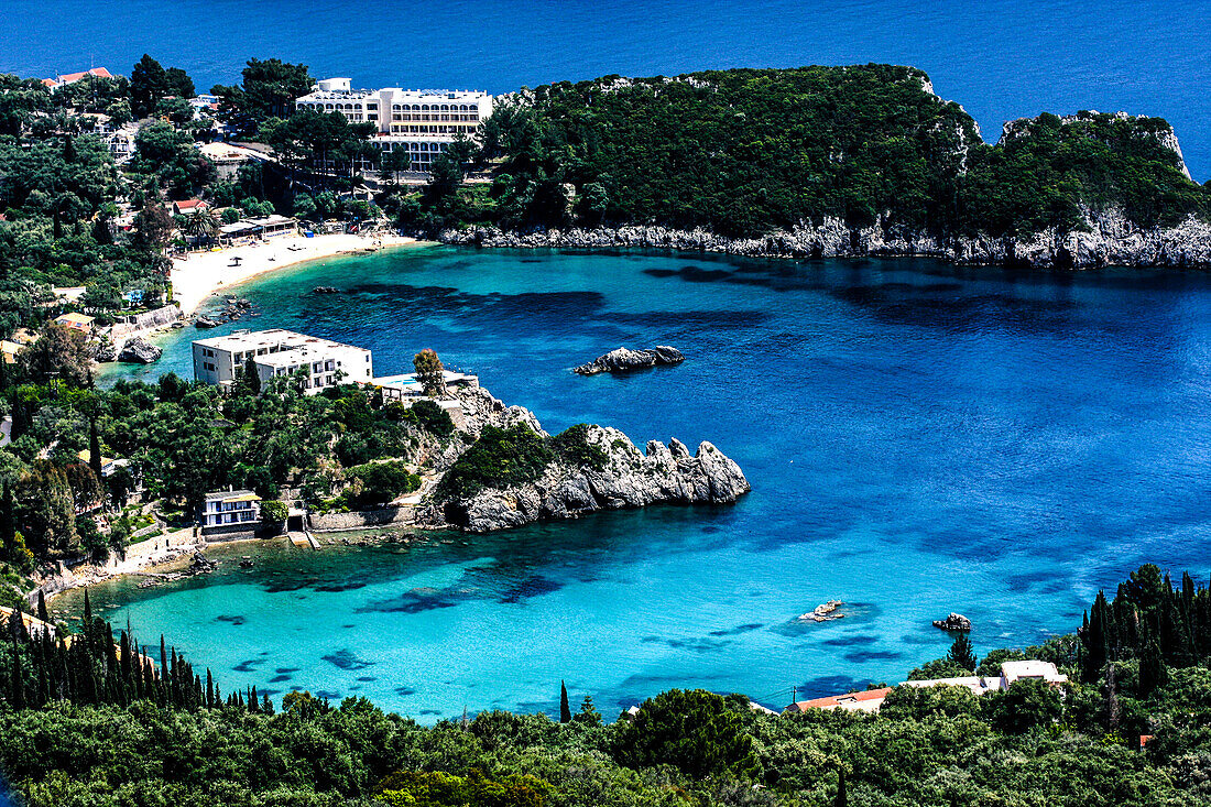 Corfu, Greece. Aerial view of beach, coves, Ionian Sea, and a resort