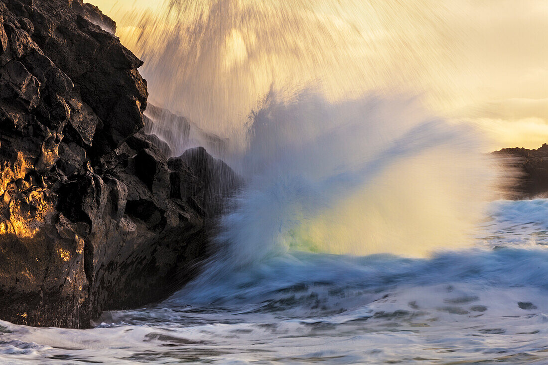 Waves from the North Atlantic ocean crash into sea stacks on the Snaefellsnes Peninsula in western Iceland