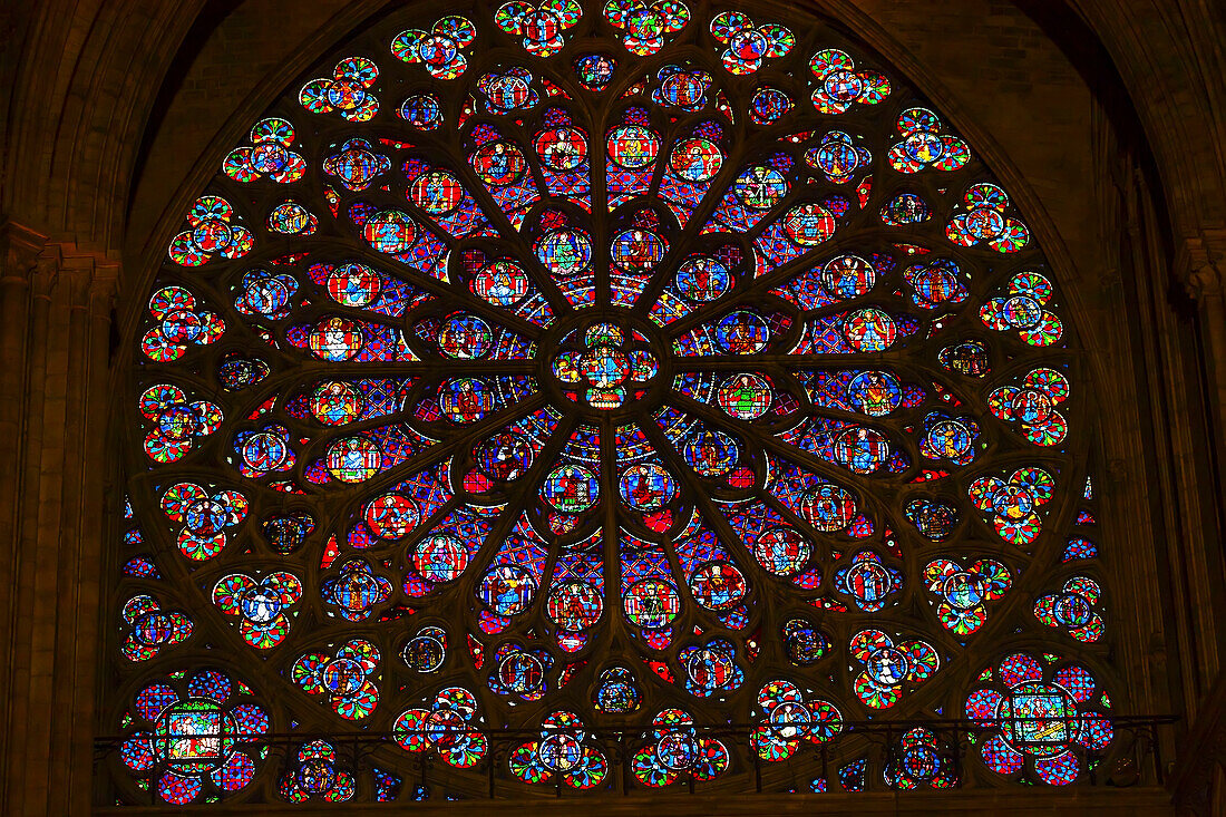 South Rose Window, Jesus and Disciples stained glass, Notre Dame Cathedral, Paris, France. Notre Dame was built between 1163 and 1250 AD.