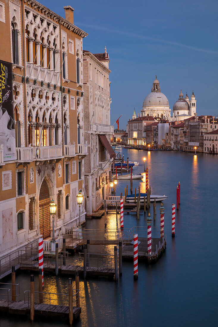 Twilight over the buildings along the Grand Canal with Santa Maria della Salute, Venice, Veneto, Italy