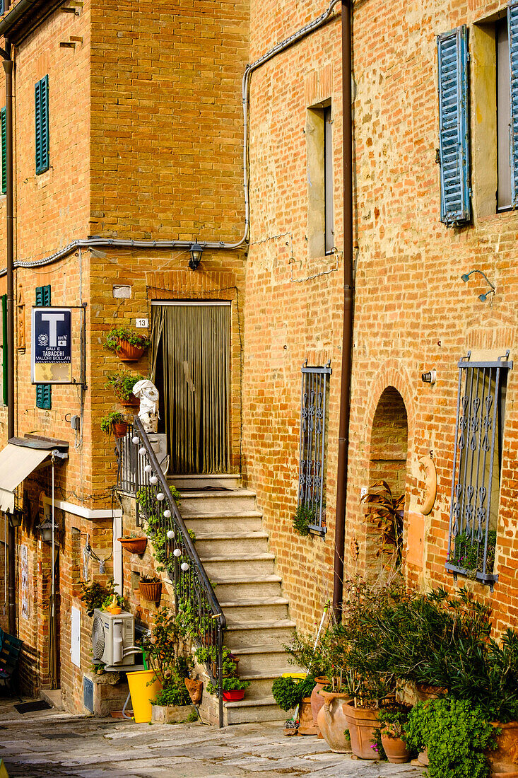 Italy, Tuscany. Brick building doorway.