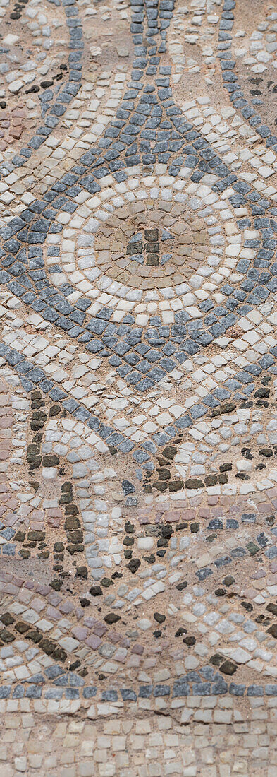 Cyprus, archaeological site of Kourion. Detail of ancient Roman mosaic floor with ornate geometric design.