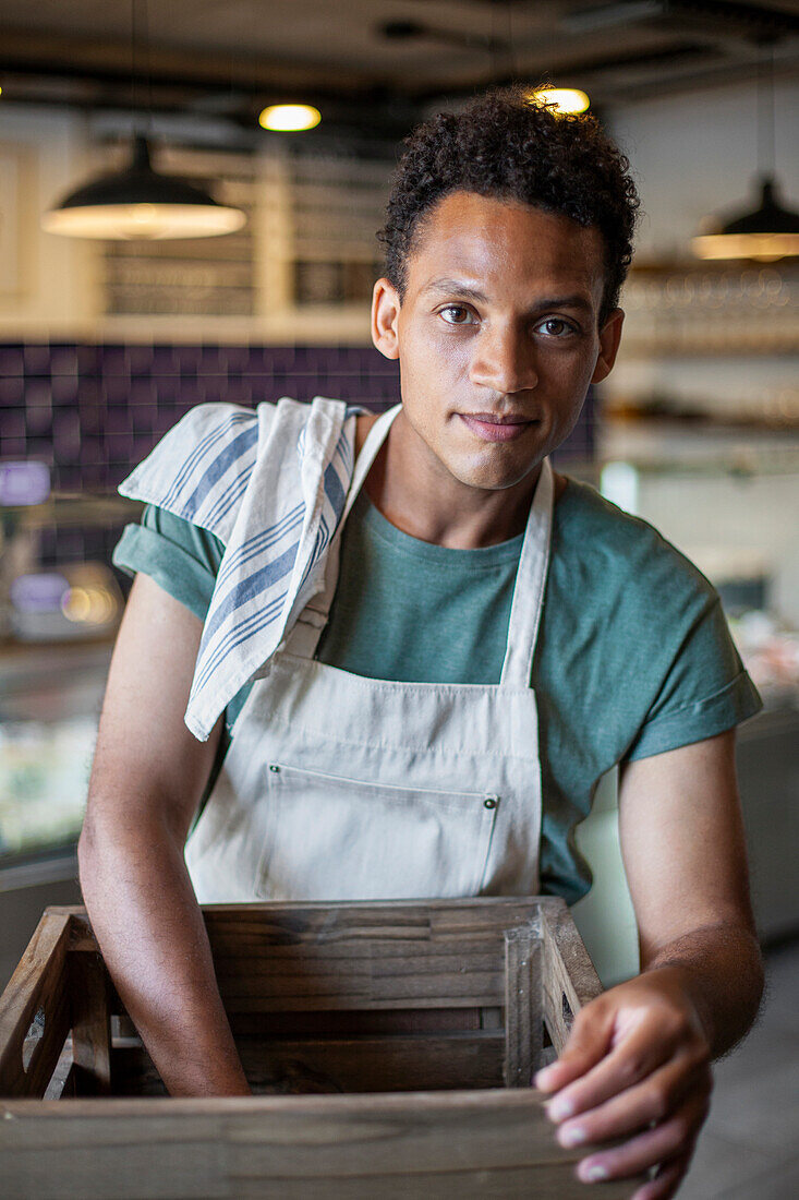 Young Latin American worker looking at the camera