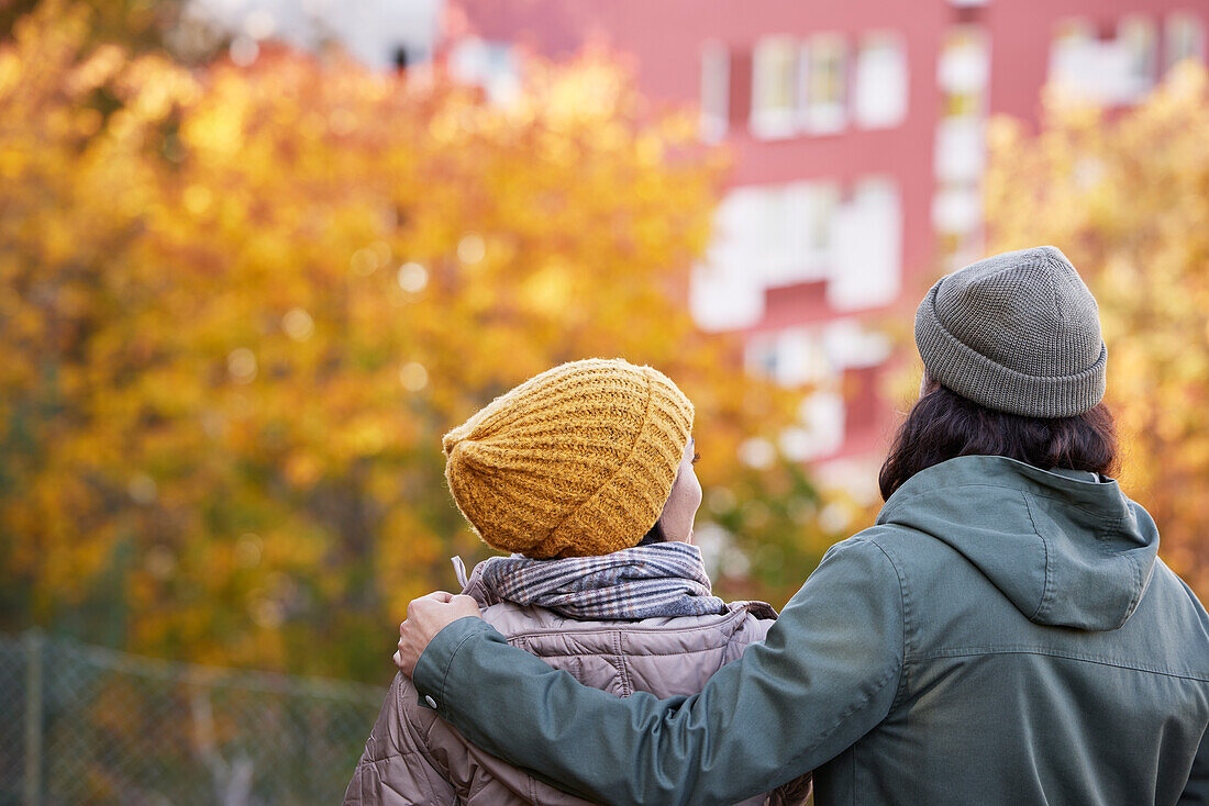 Happy couple in autumn scenery