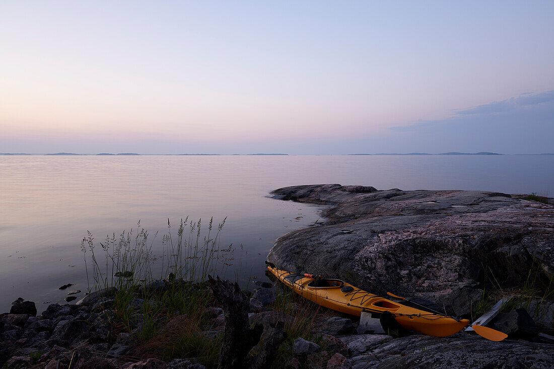 Kayak on rocky coast