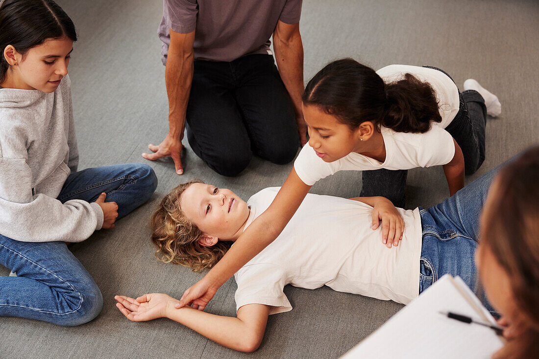 Teachers giving first aid training