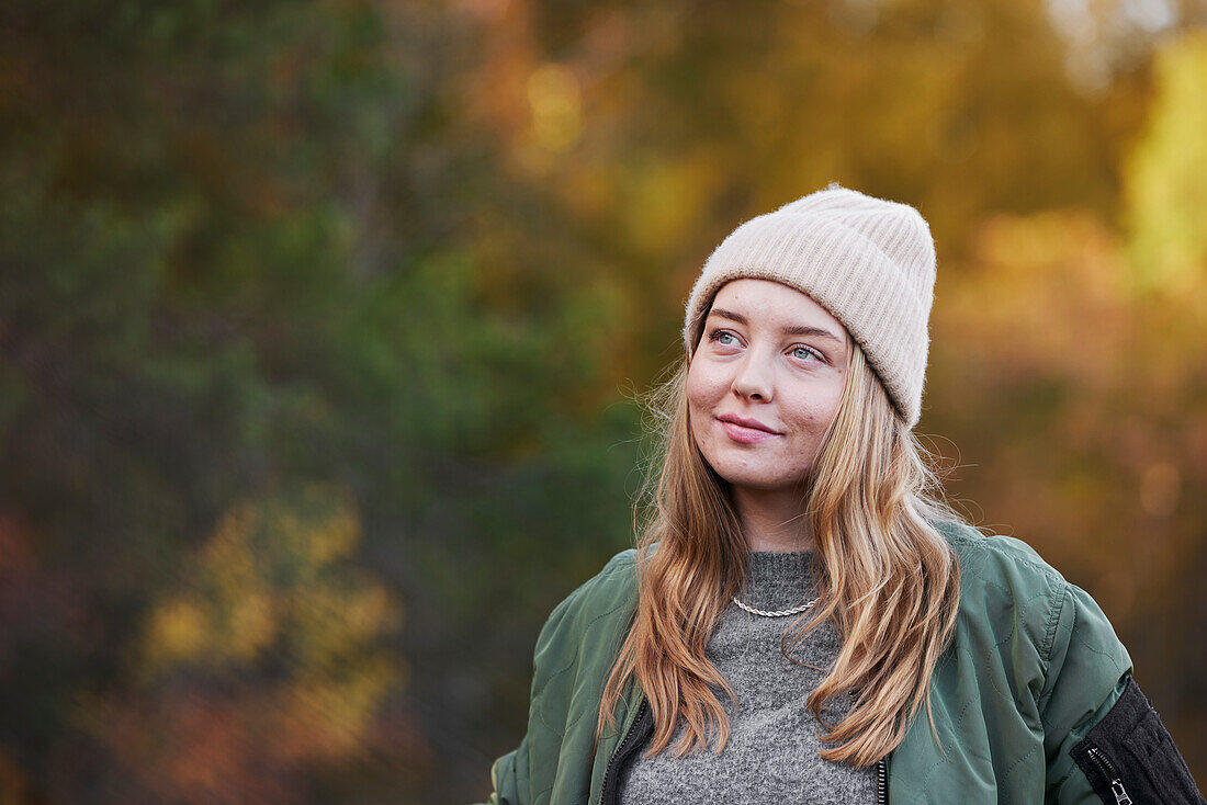 Smiling woman looking away