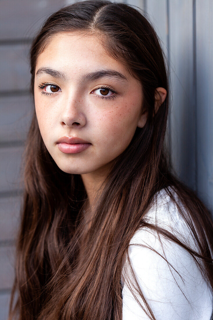 Portrait of teenage girl looking at camera