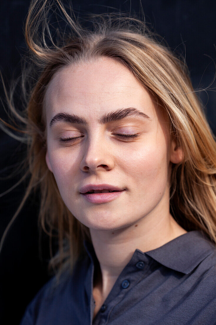 Portrait of young blond woman