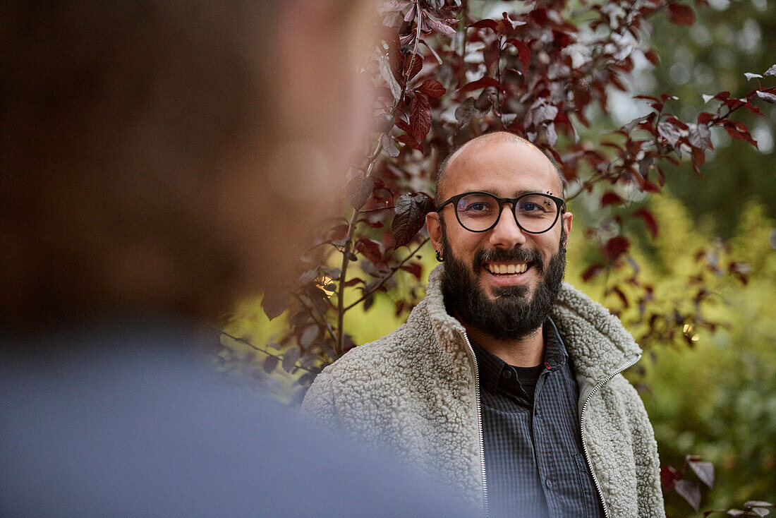 Smiling man looking away