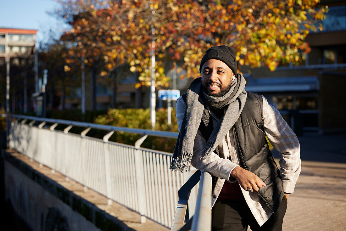 Smiling man looking away