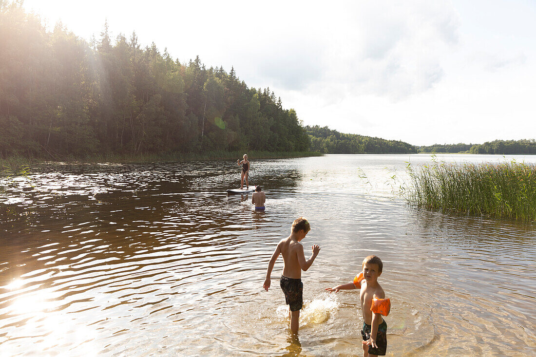 Kids playing in lake