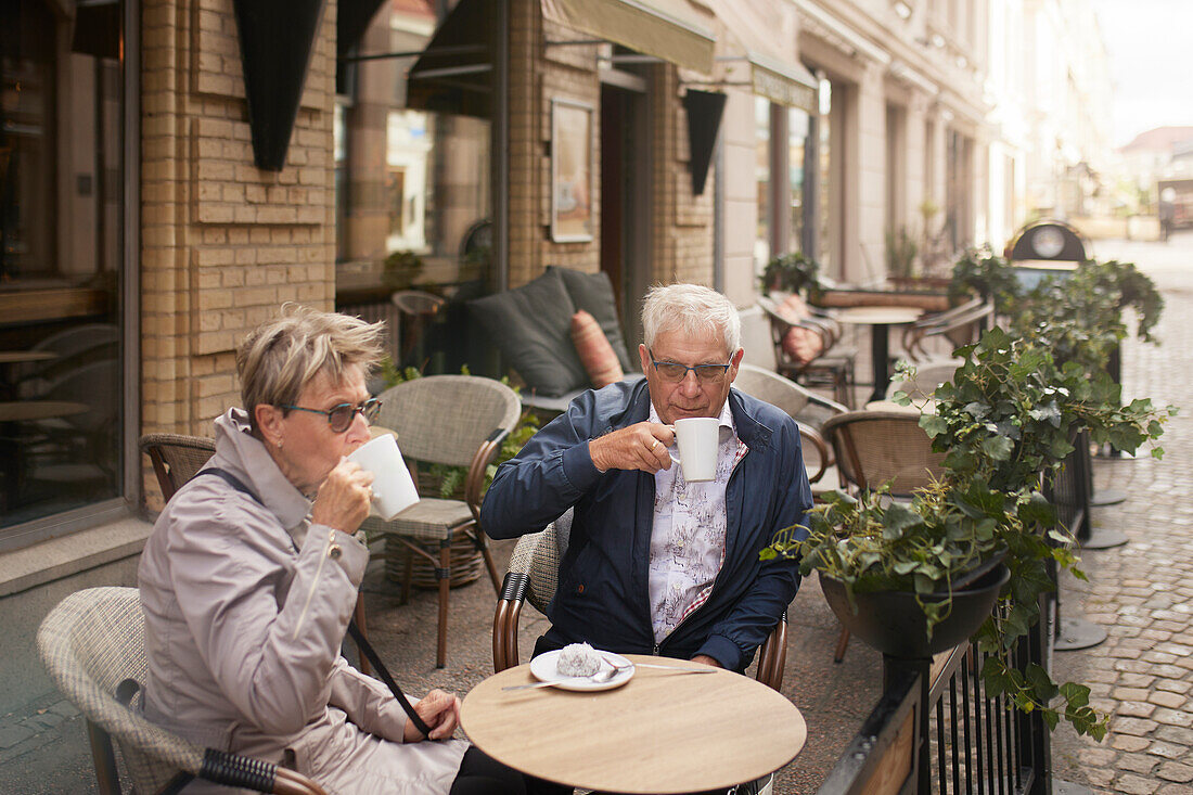 Mature couple having coffee