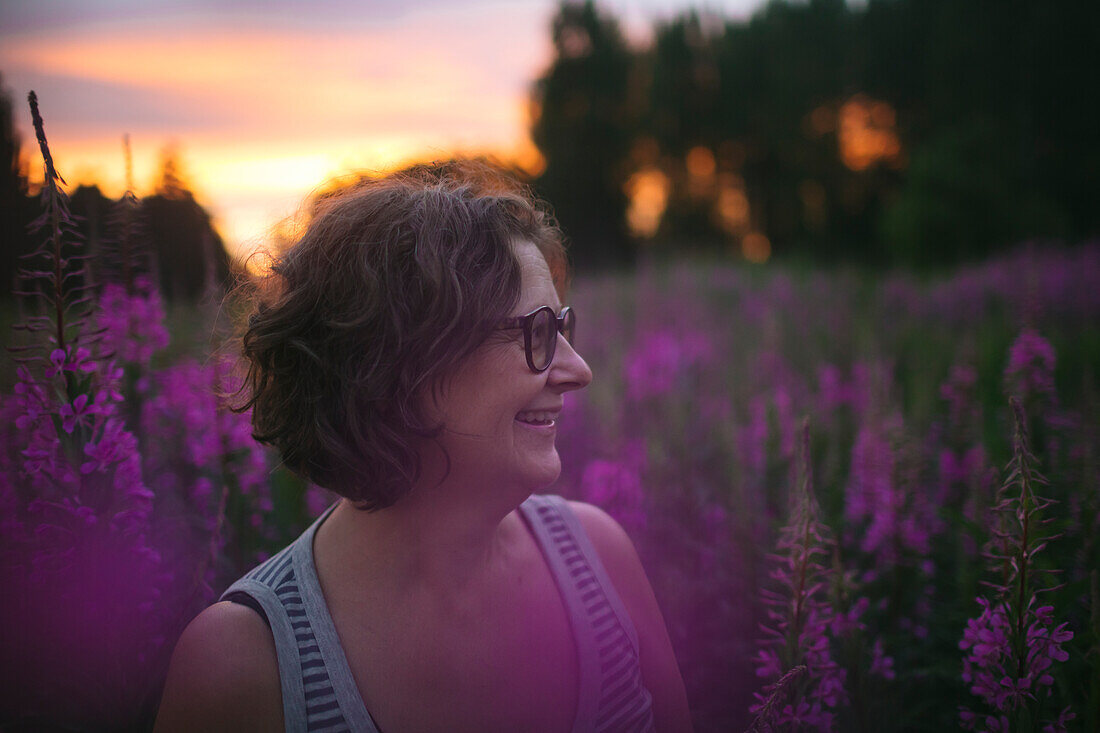 Portrait of mature woman at sunset