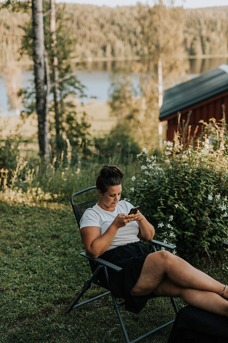 Young woman using cell phone