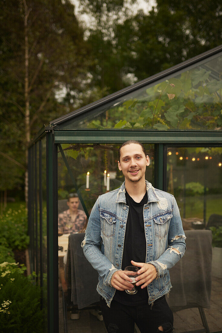 Smiling man looking at camera