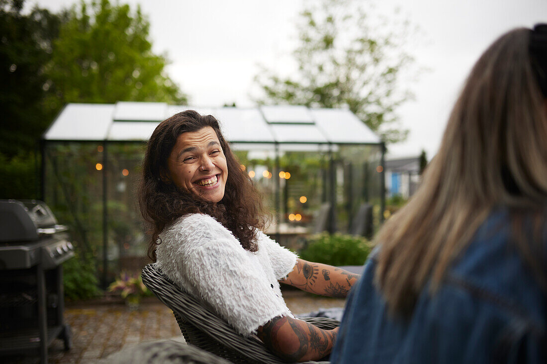 Happy man sitting at table