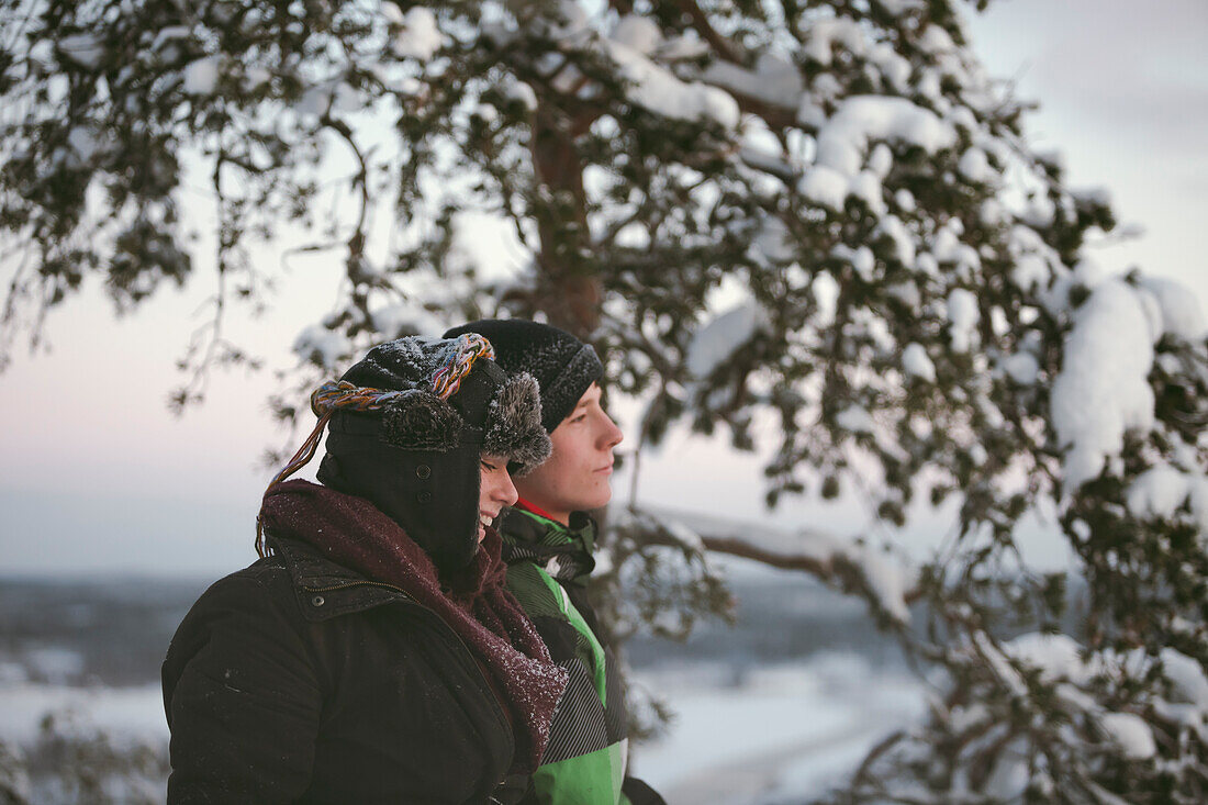 Two teenage boys in winter scenery