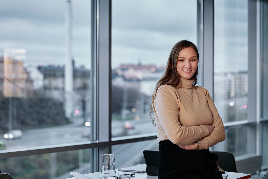 Portrait of young businesswoman in office