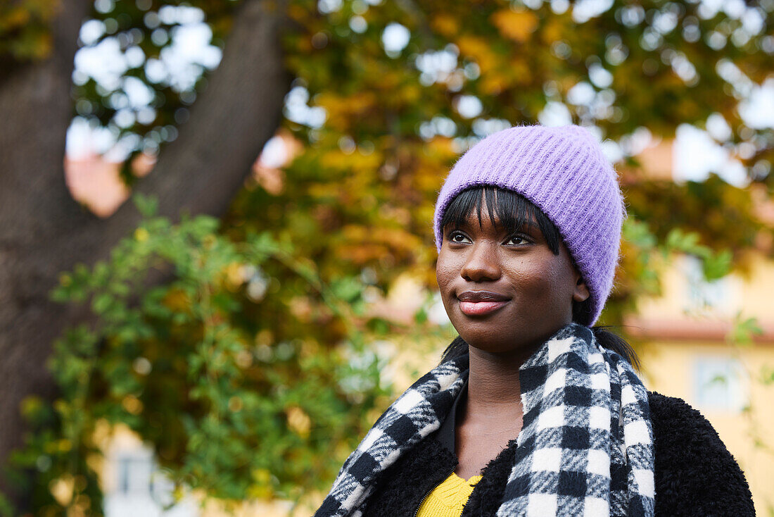 Smiling woman looking away