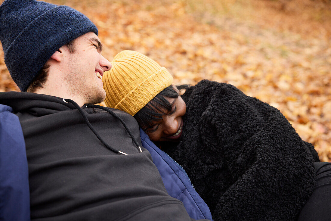 Young couple lying together