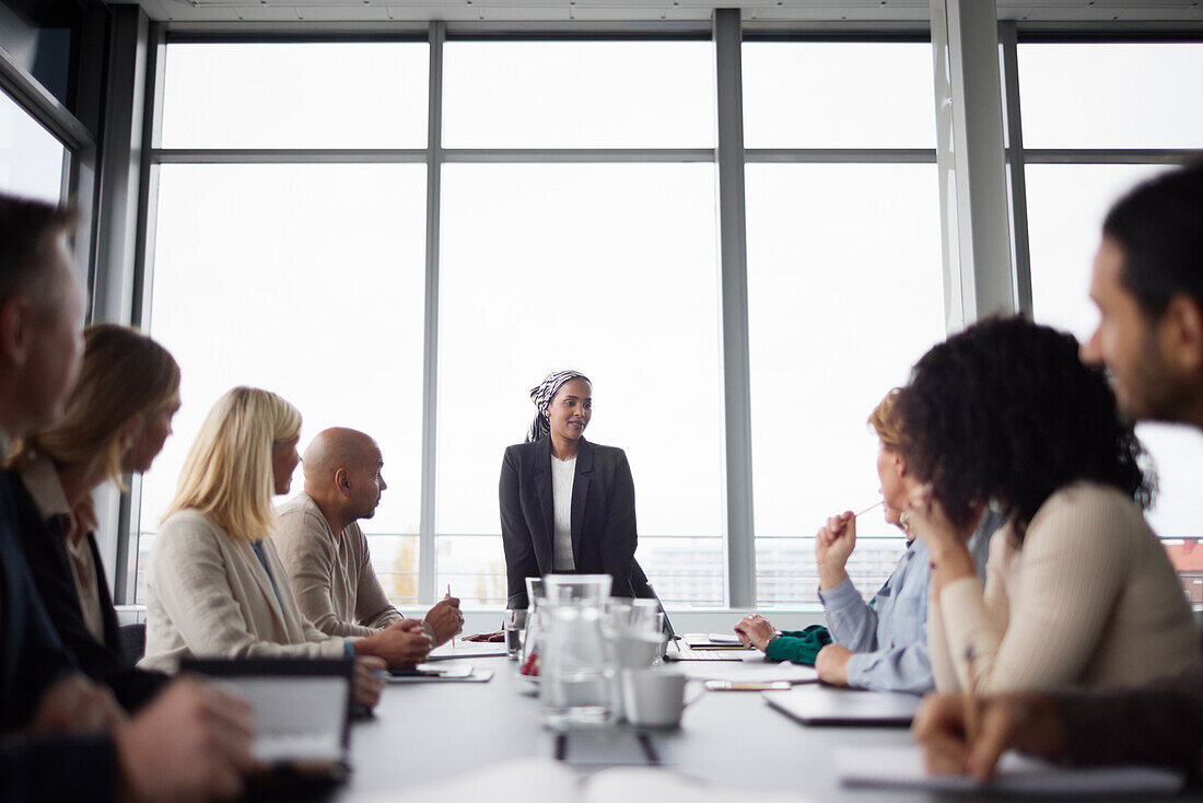 Woman talking during business meeting