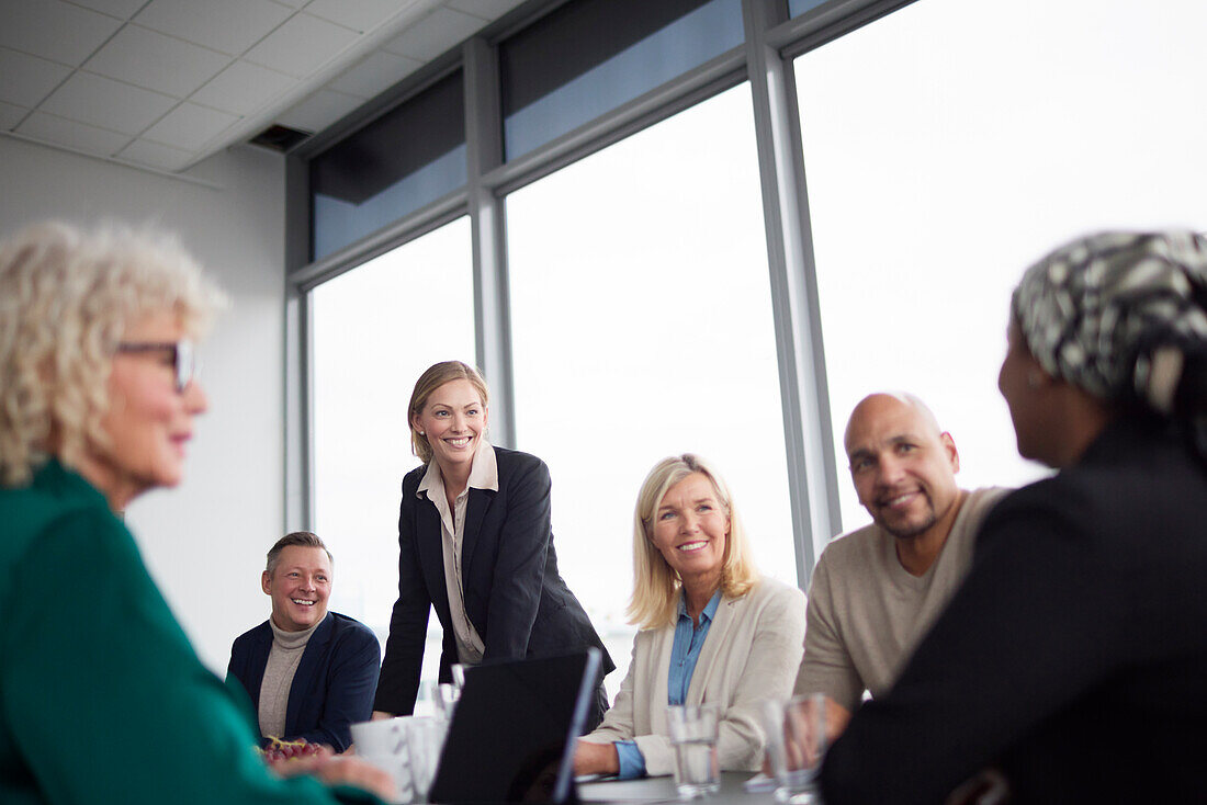 Woman talking during business meeting