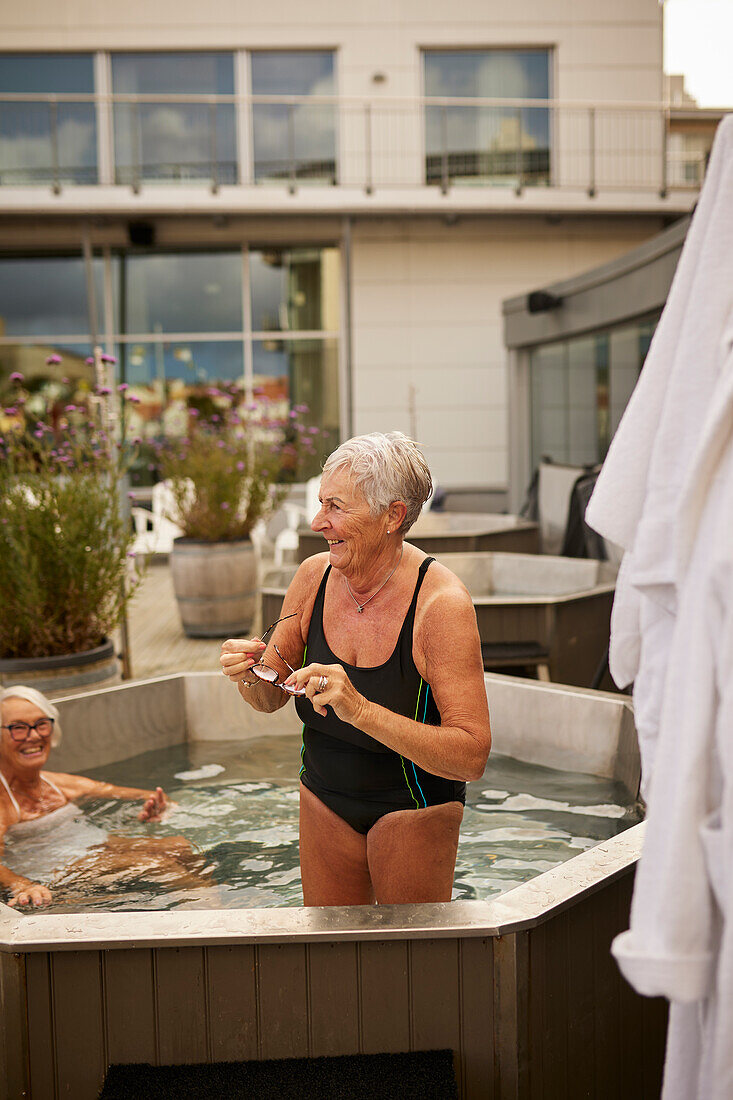 Senior women relaxing in hot tub