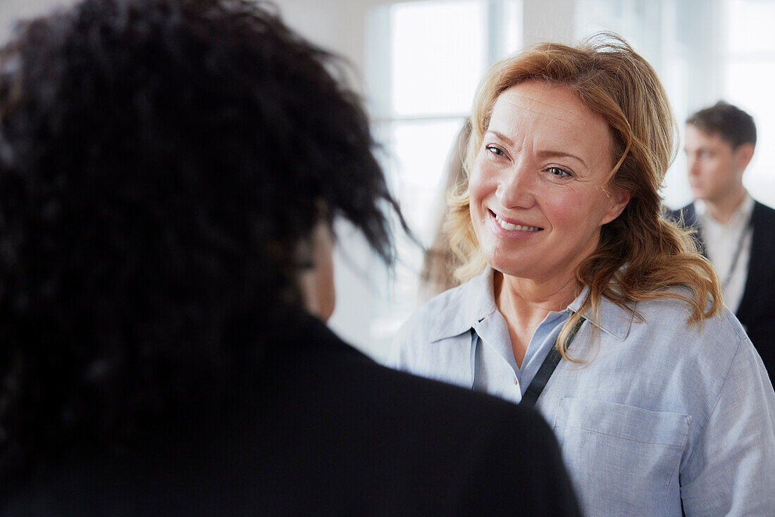 Smiling businesswoman talking